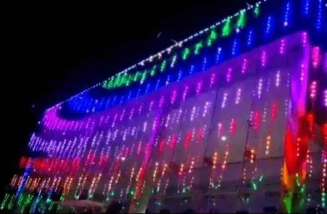 Building with colourful running lights