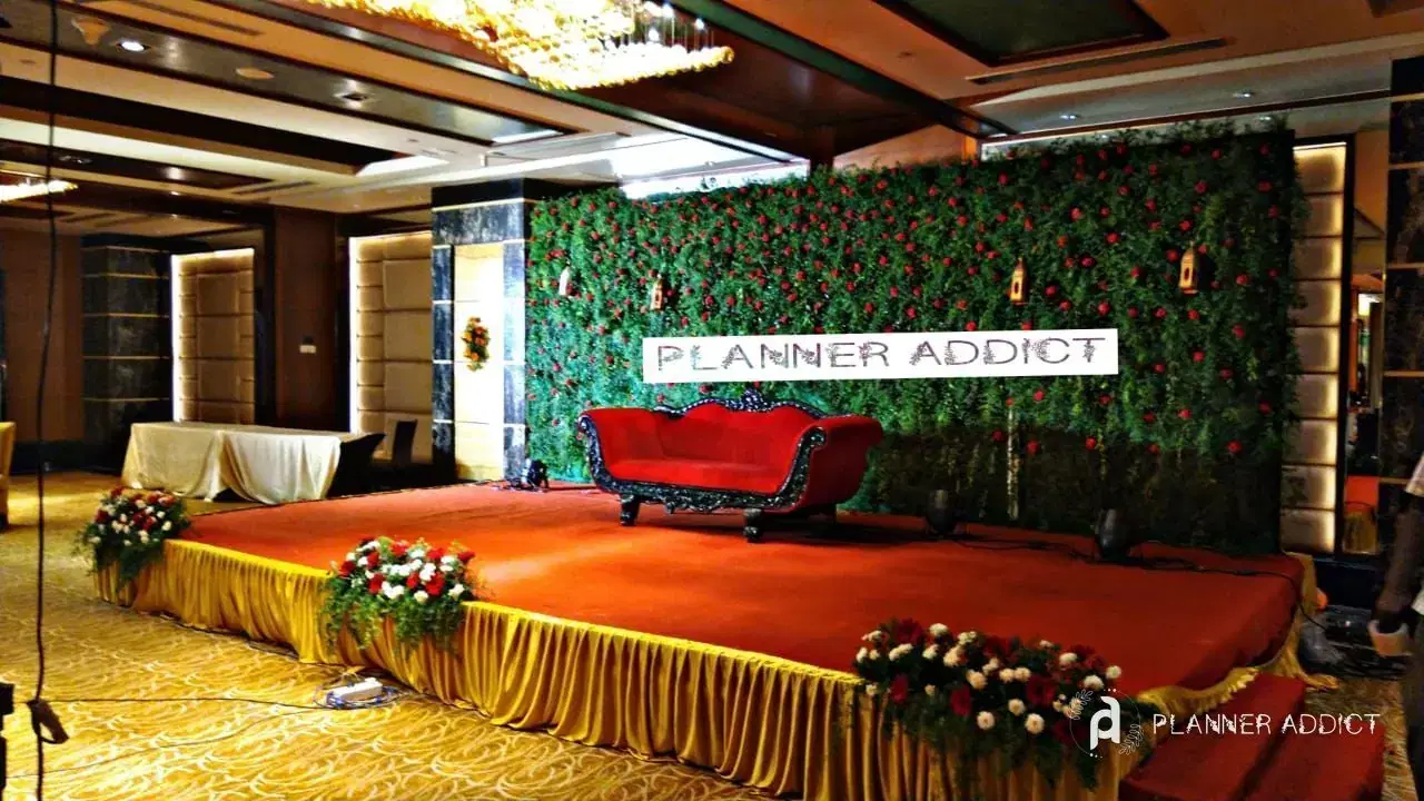 Stage with a green wall backdrop
