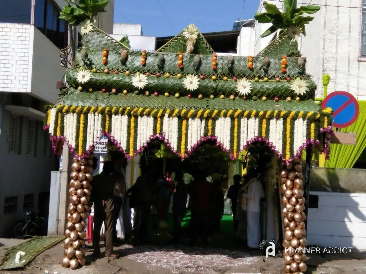 Chappara with a leaf crown, flower strings and decorated pillars